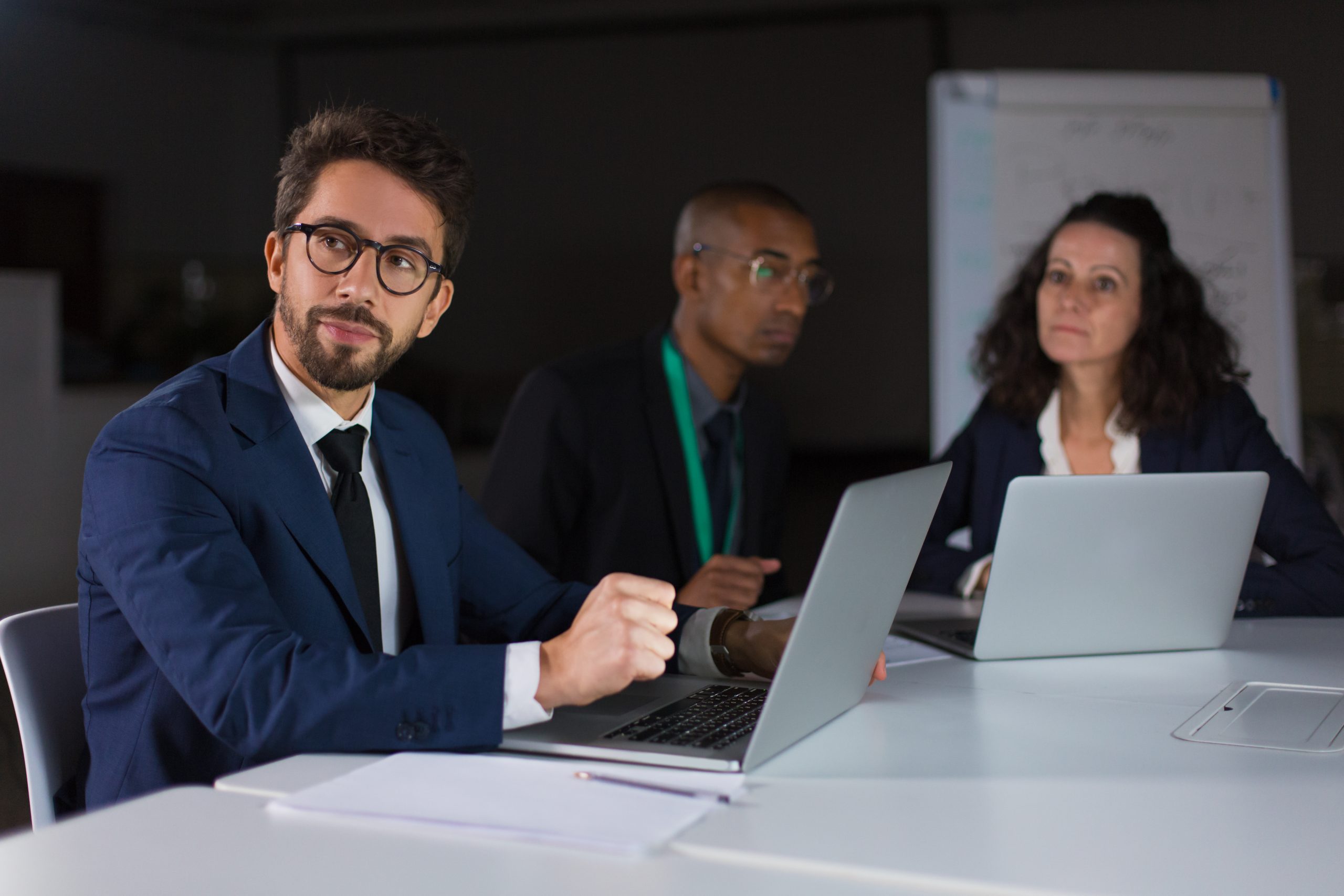 A business professional in India advancing their career with an online MBA on their laptop